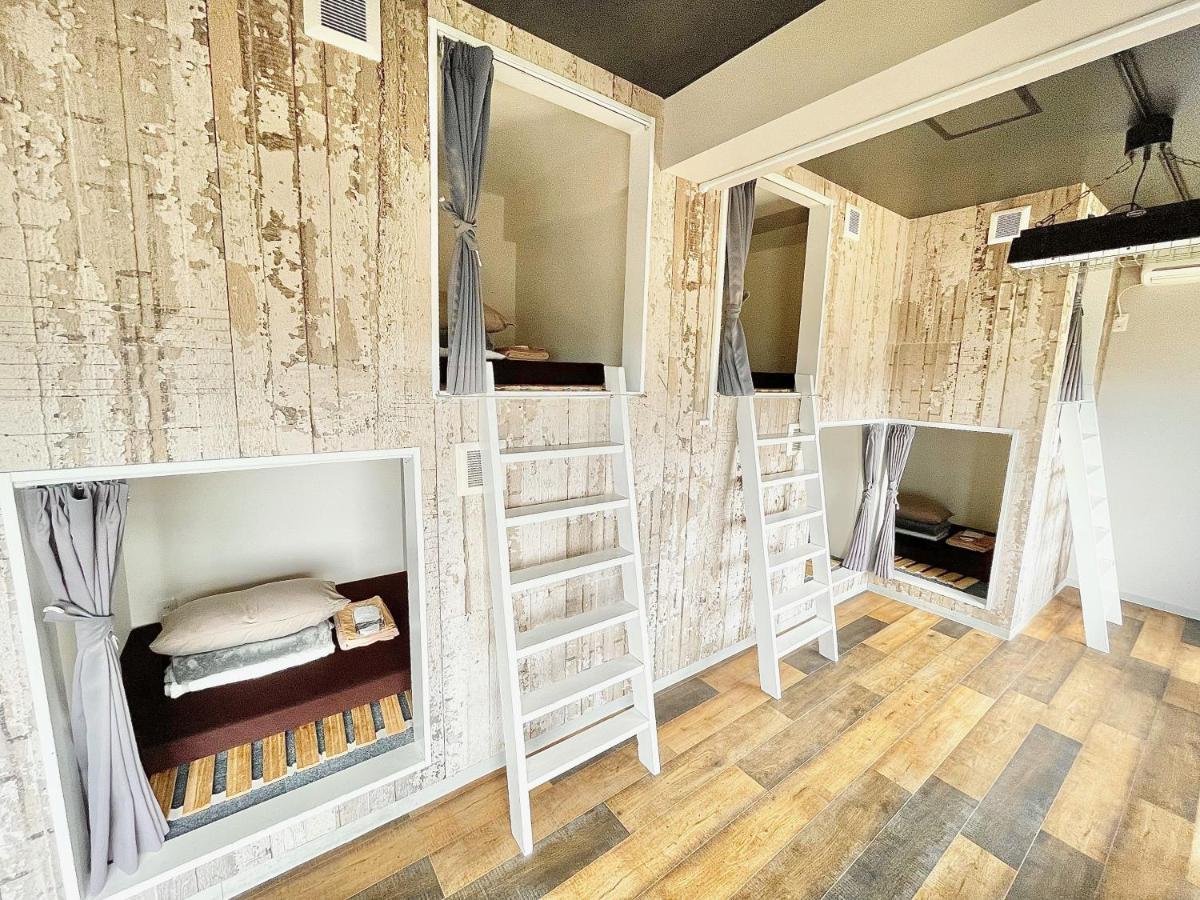 Отель Book Tea Bed Izuoshima Экстерьер фото